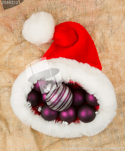 Image of Santas hat filled with Christmas balls