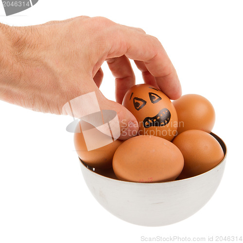 Image of Scared egg, waiting to be grabbed by a hand