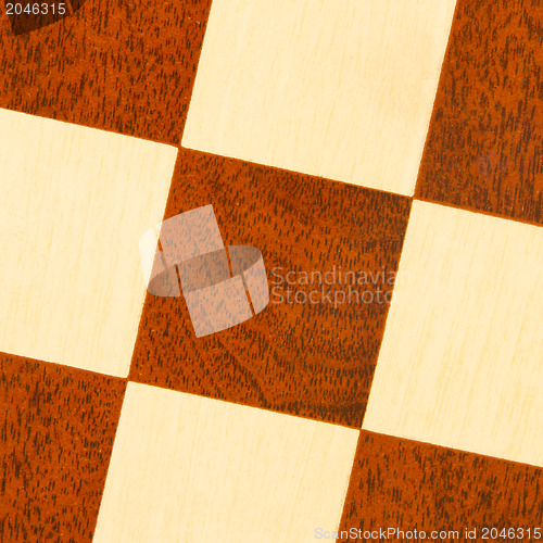 Image of Very old wooden chess board, isolated