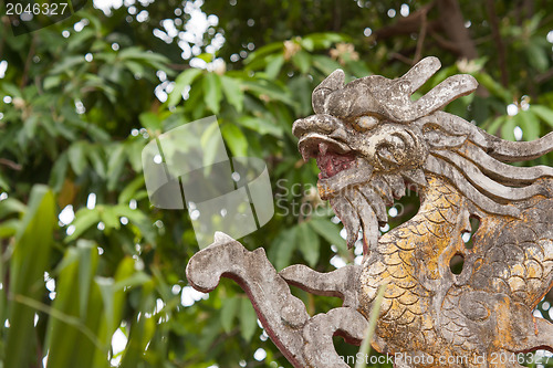 Image of Chinese dragon ornament on a rooftop