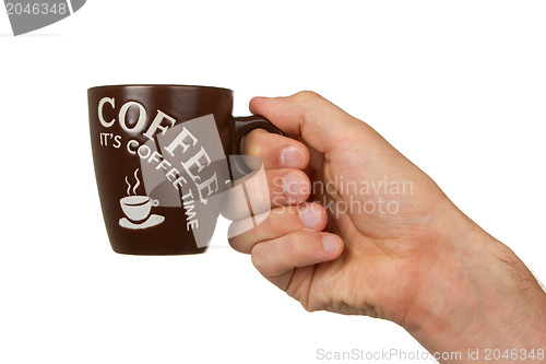Image of Man holding a cup of coffee
