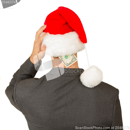 Image of Business man with a santa hat, santa's crisis budget
