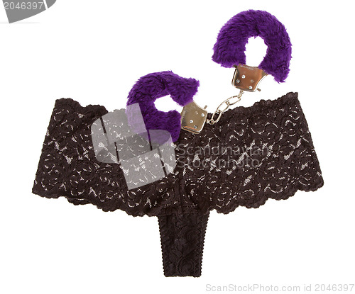 Image of Fluffy purple handcuffs and panties, prostitution