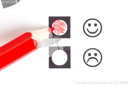 Image of Red pencil choosing the right smiley