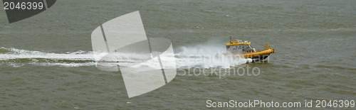 Image of Yellow Crewtender at high speed