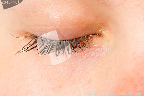 Image of Women eye, close-up, blue, tear