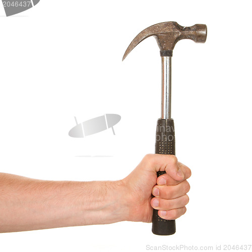 Image of Man holding a old metal hammer