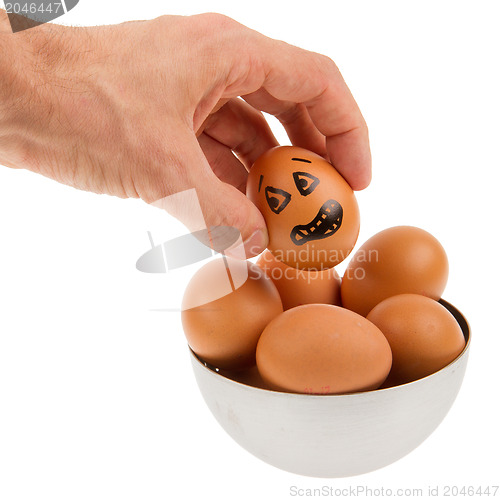 Image of Scared egg, waiting to be grabbed by a hand