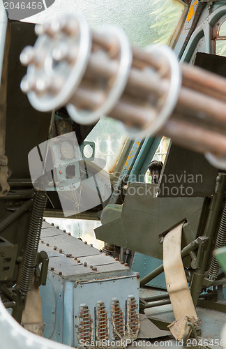 Image of Chaingun in an old American helicopter used in the Vietnam war,f