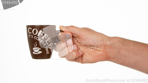 Image of Man holding a cup of coffee