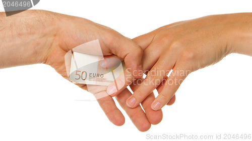 Image of Man secretly giving 50 euro to a woman