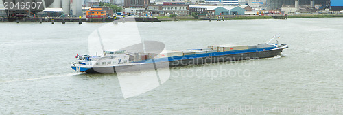 Image of Motor cargo barge in the harbor of Rotterdam 