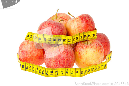 Image of Red apples with a yellow tape-measure