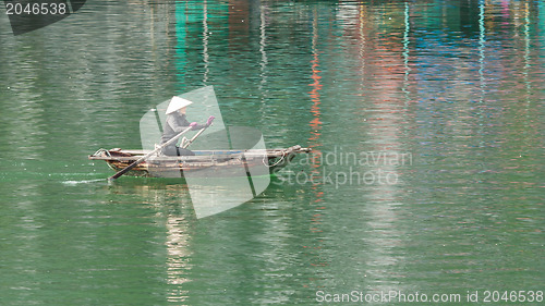 Image of HA LONG BAY, VIETNAM AUG 10, 2012 - Food seller in boat. Many Vi