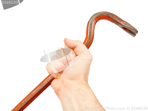 Image of Hand holding old red crowbar