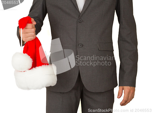 Image of Business man with a santa hat 