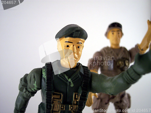 Image of perspective of two toy soldiers