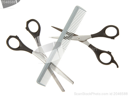 Image of Hair cutting shears and comb
