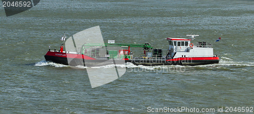 Image of Small chemical tanker sailing in the port of Rotterdam (Holland)