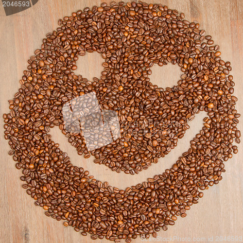 Image of Coffee grains arranged in smiley
