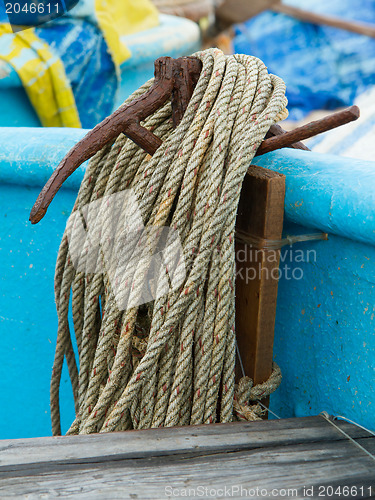 Image of Old rusty anchor on a fishingboat