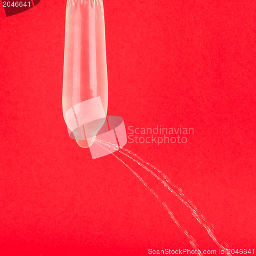 Image of Condom with water but leaking
