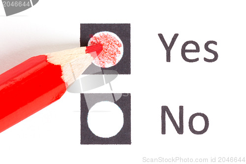 Image of Red pencil choosing between yes or no