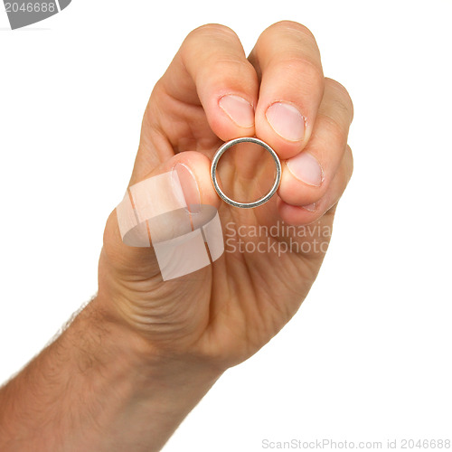 Image of Man holding a silver ring