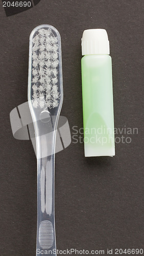 Image of Toothbrush and green toothpaste isolated