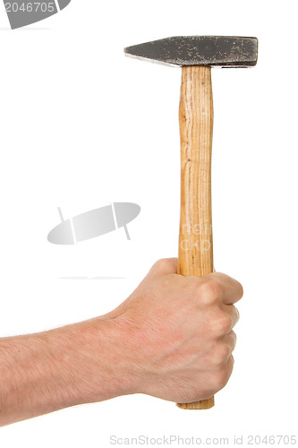 Image of Man holding a old wooden hammer