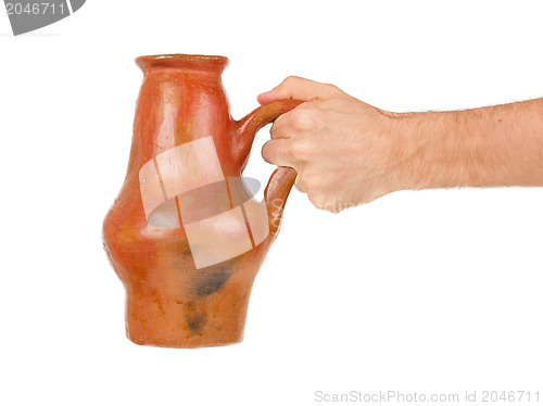 Image of Man holding old earthen bowl