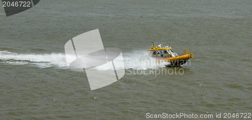 Image of Yellow Crewtender at high speed