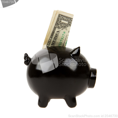 Image of Black piggy bank with one dollar