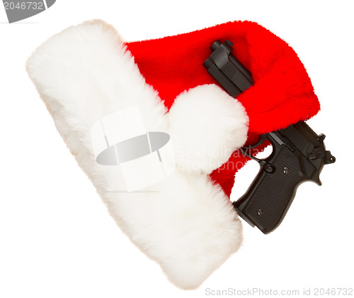 Image of Weapon (firearm) concealed in santas hat