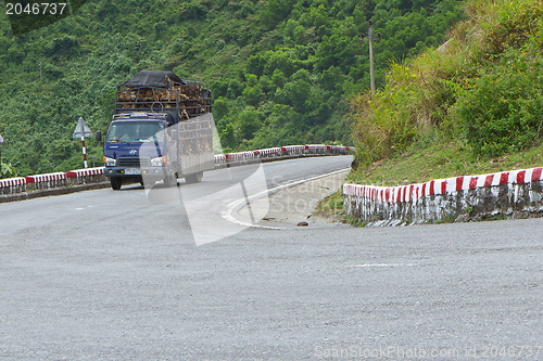 Image of HUÉ, VIETNAM - AUG 4: Trailer filled with live dogs destined fo