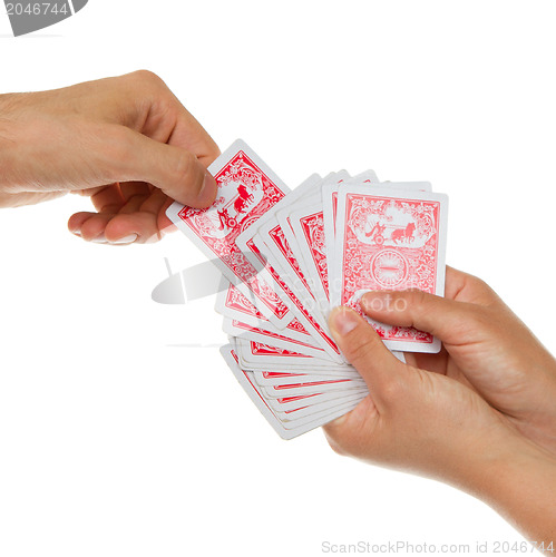 Image of Man picking a playing card