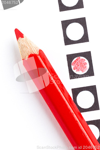 Image of Red pencil on a voting form