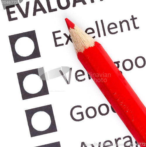 Image of Red pencil on a evaluationform