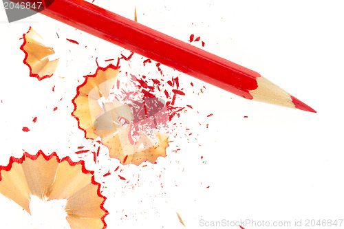 Image of Red pencil and wood shavings