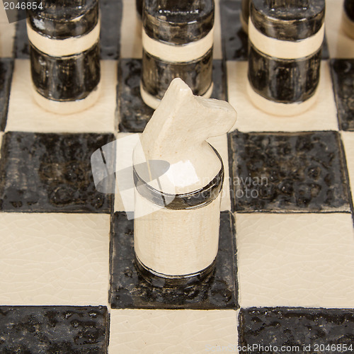 Image of Unique handmade chess set (pottery), isolated