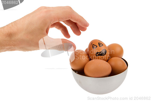 Image of Scared egg, waiting to be grabbed by a hand