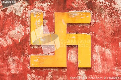 Image of NHA TRANG, VIETNAM 31 JULY 2012 - Swastika symbol on an ancient 