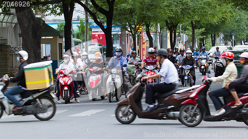 Image of SAIGON - JULY 23: A busy and congested road in Hanoi, Vietnam, J