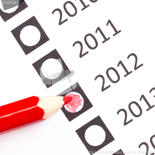 Image of Red pencil choosing a date 