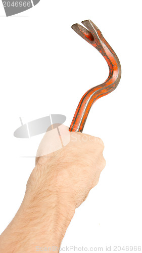 Image of Hand holding old red crowbar