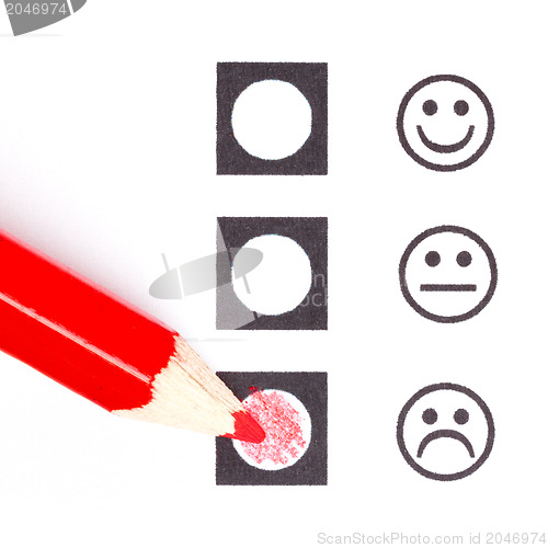 Image of Red pencil choosing the right smiley