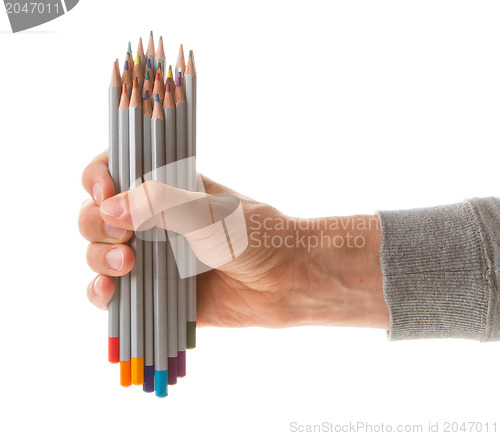 Image of Man holding several color pencils