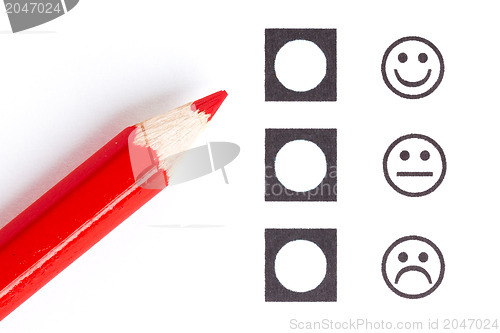 Image of Red pencil choosing the right smiley