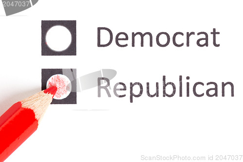 Image of Red pencil choosing between democrat and republican