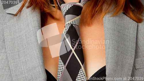 Image of Caucasian business woman with a tie